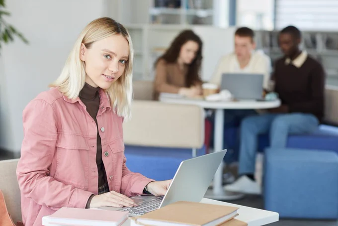 SensusAccess promotional image: Students using a laptop 