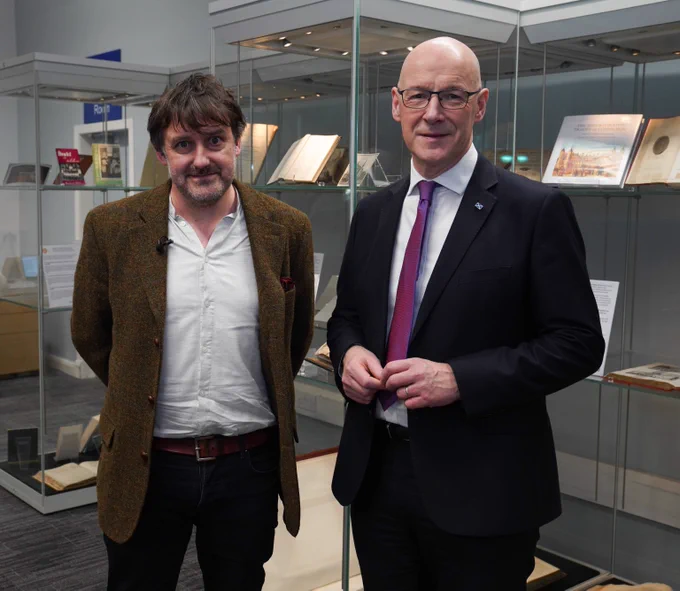 First Minister John Swinney with Scotland's new Makar, Peter Mackay. 