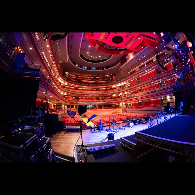 A shot from the rear side of the stage, facing out to the empty Brighton Dome, presumably not long before doors opened and the many awaiting seats were filled with audience.