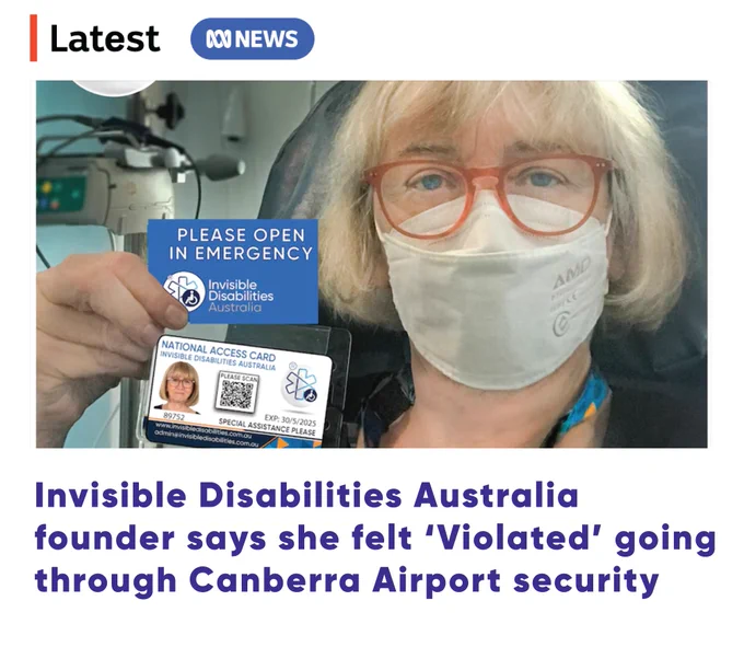 disabled woman in hospital bed holding up a National Access Card and PLEASE OPEN IN EMERGENCY CARD  with invisible Disabilities Australia signs on cards