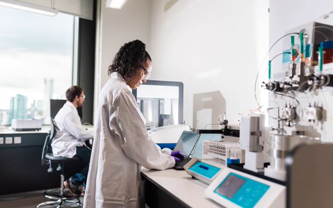 Students performing an experiment in the lab.