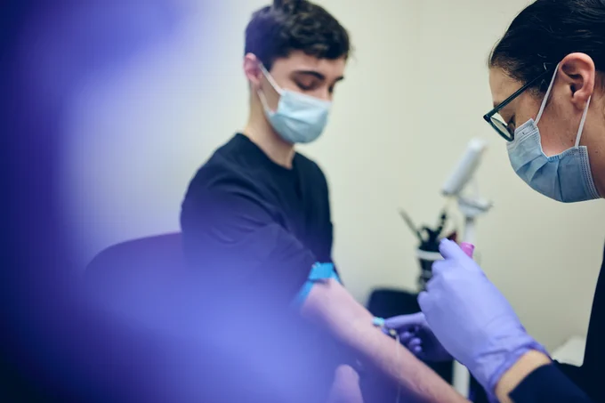 An RFU student getting their blood drawn