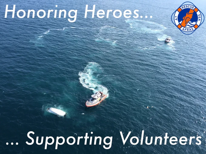 Photograph of a capsized boat with rescue boats near it, with text that reads "Honoring Heroes ... Supporting Volunteers" and the logo for the Association for Rescue at Sea