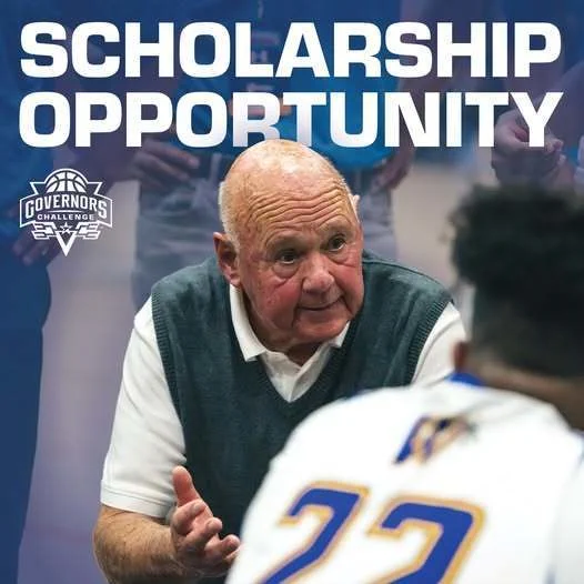 Image of Wicomico High Boys Basketball Coach Butch Waller talking to a player in the huddle