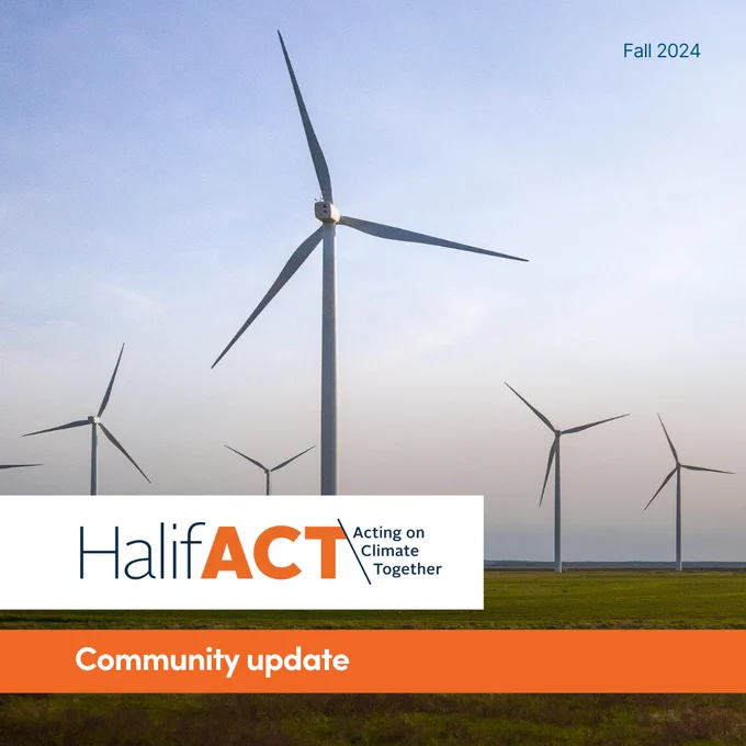 Cover of sixth community update. Depicts a rural wind farm.