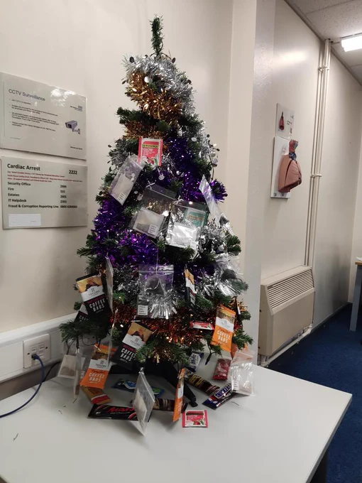 Christmas tree with tea or coffee bags and hot chocolate.