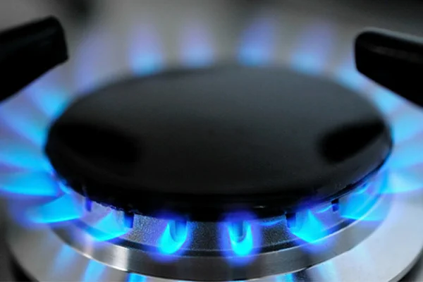 Close up of a lit gas hob