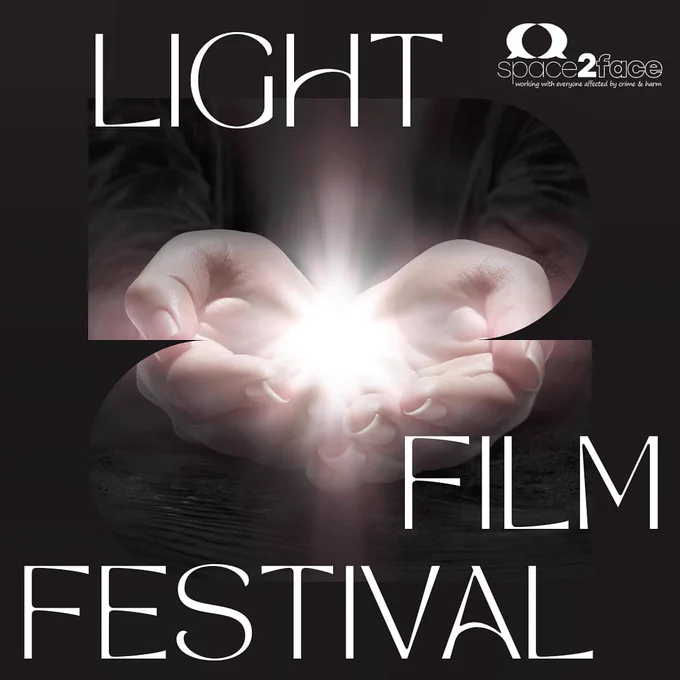 two hands put together to hold a little source of light, in a black background. The poster reads Light Film Festival and indicates the organisation Space2face