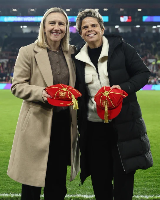 Sue Smith and Laura Bassett receiving their legacy caps in Sheffield. 