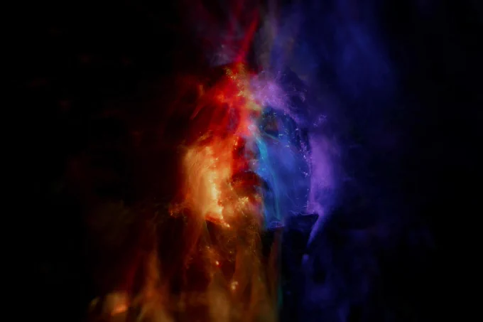 Abstract image featuring a dynamic blend of swirling colors, including intense reds, deep blues, and shadowy blacks, resembling a cosmic nebula.