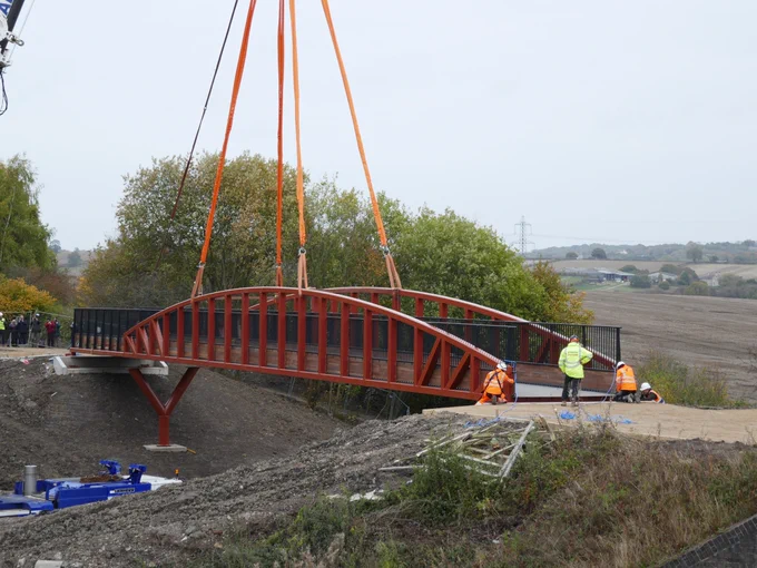 The new bridge across the canal being lowered into place. 