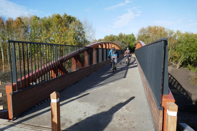 Two cyclists trying out the new bride over the Chesterfield Canal. 