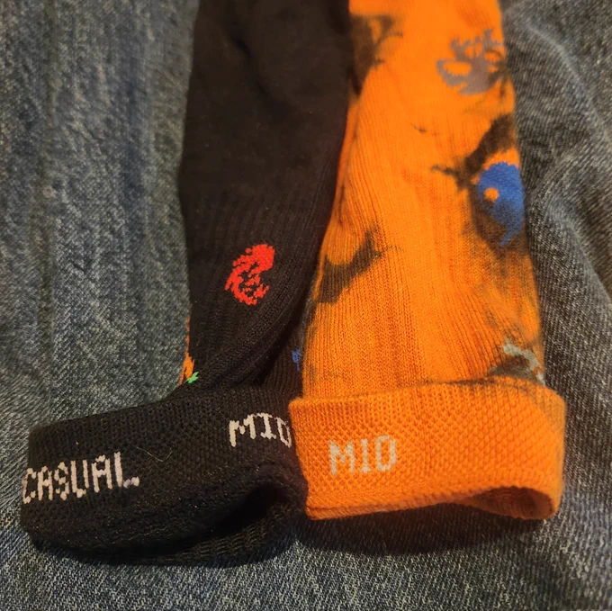 The inside of the socks say "Casual" and  "MID"
