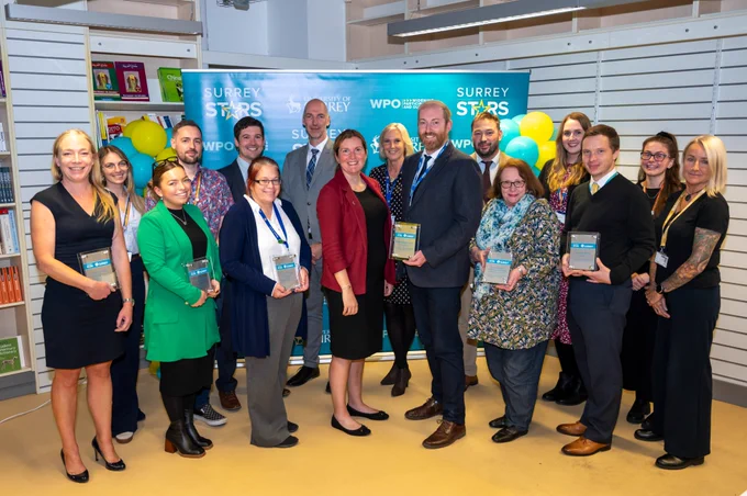 The image shows all those present at the partnership launch, including members of the WPO team, Kerry Matthews of the University of Surrey, and senior staff members from the partner schools. 