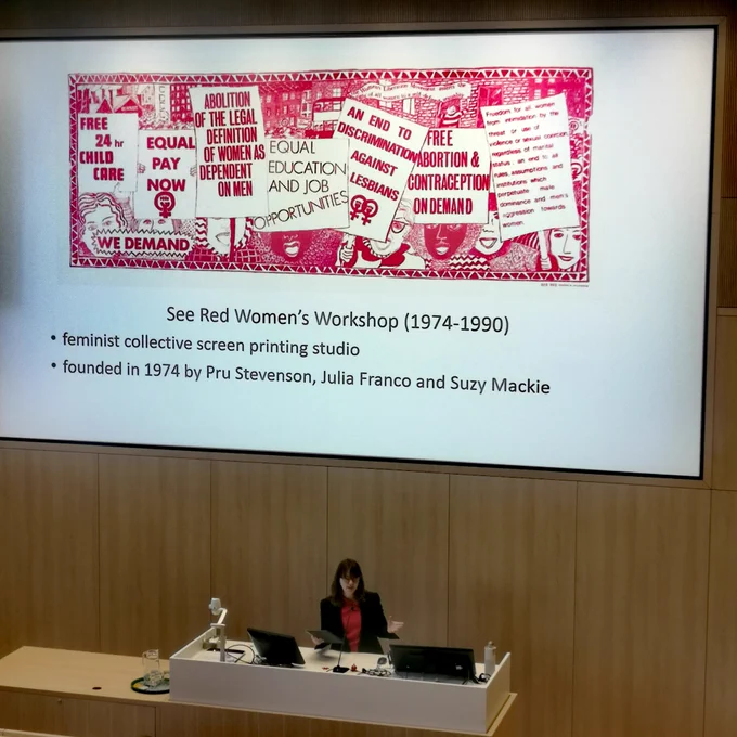 Irene Valenti in front of her presentation 