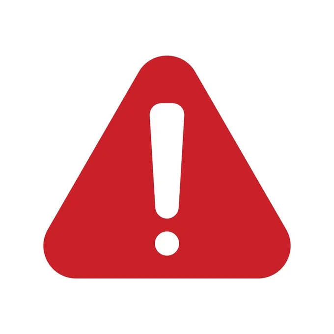 A white exclamation mark in a red triangle. 