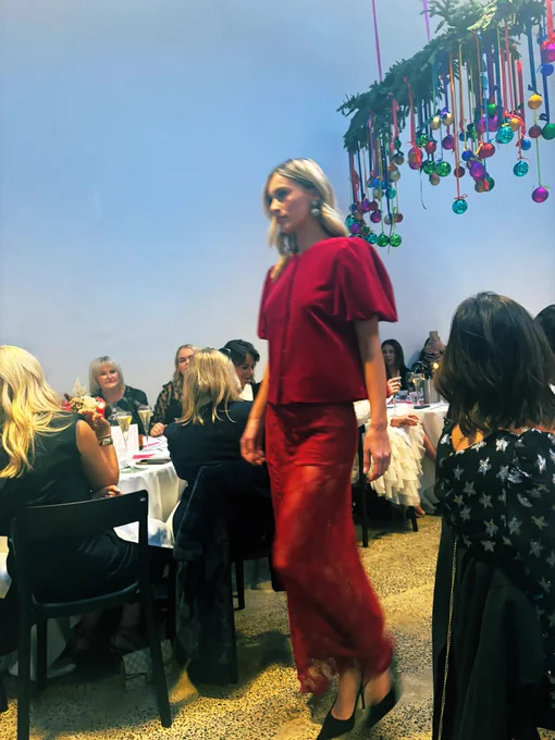 Model wearing red