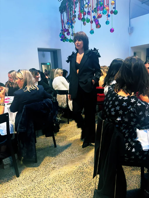 Model wearing black suit