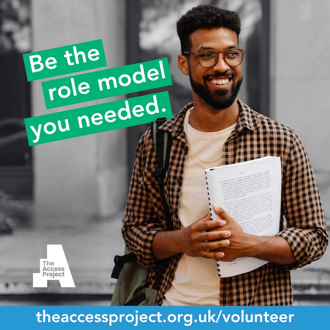 Male volunteer smiling, wearing glasses, carrying papers. Text reads: Be the role model you needed. Theaccessproject.org.uk/volunteer.