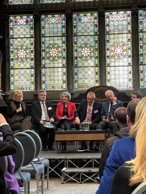 Image shows panel discussion
