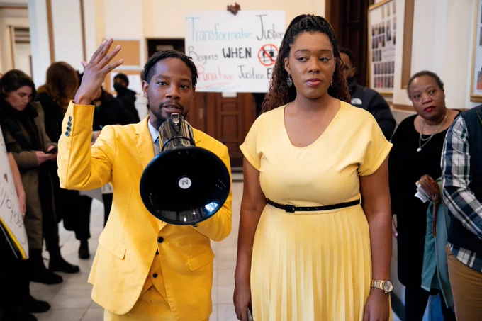 St. Louis Board of Aldermen members Rasheen Aldridge, of the 14th Ward, and Alisha Sonnier, of the 7th Ward, speak as demonstrators from the Freedom Community Center call for public hearings on deaths at the city jail. 