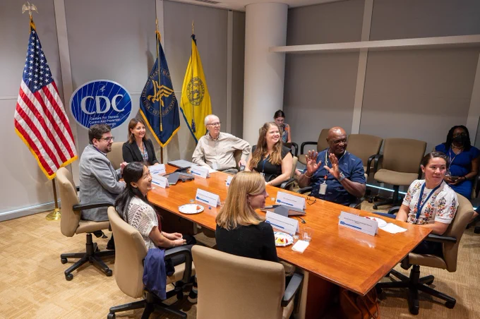 CDC Director Dr. Mandy Cohen sits in a meeting with CDC staff