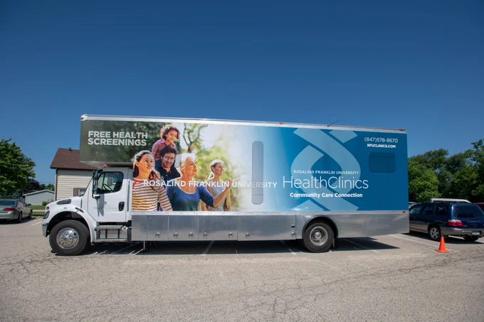 A side view of the Community Care Connection mobile vehicle