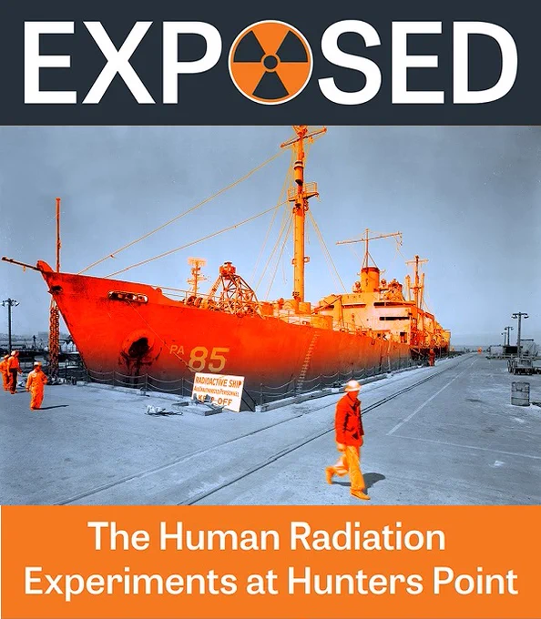 A docked ship, with a sign in front: "RADIOACTIVE SHIP / ALL UNAUTHORIZED PERSONNEL KEEP OFF"