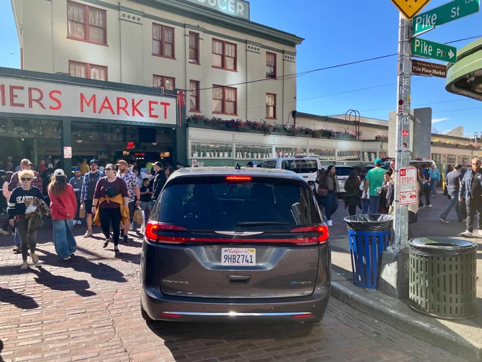 Lost California tourist driving through the middle of the market