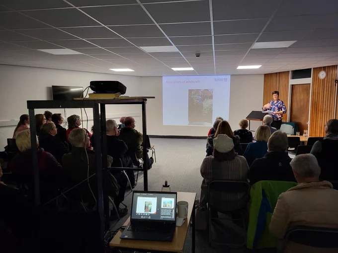 Colour photograph of 'Beyond the Lancashire Witches: Accusations of Witchcraft Past and Present' with Professor Charlotte Baker from the School of Global Affairs at Lancaster University. The talk was really busy, and a lively discussion was had afterwards.