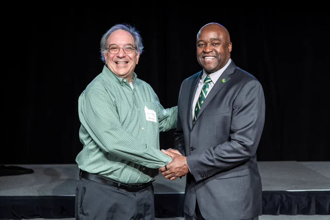 University Gold Day Service Awards program celebrating employees 20-50 years of service in Dewberry Hall on the Fairfax Campus.