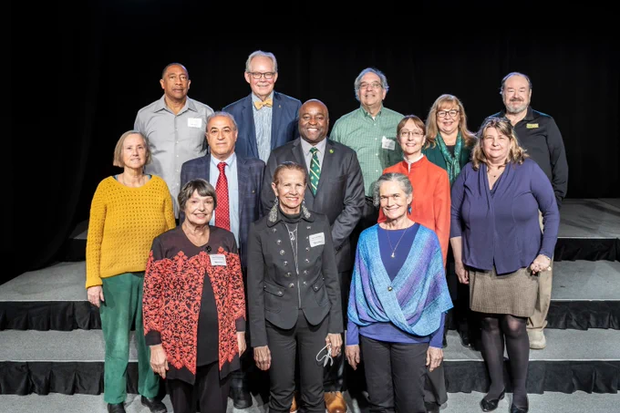 University Gold Day Service Awards program celebrating employees 20-50 years of service in Dewberry Hall on the Fairfax Campus.
