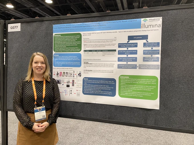 Emily Dalton, Associate Director of Oncology Medical Affairs at Illumina, with her poster at AMP 2024.