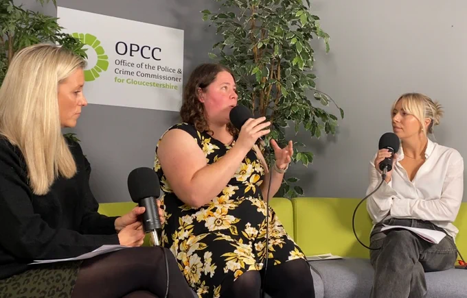 Three women sat talking