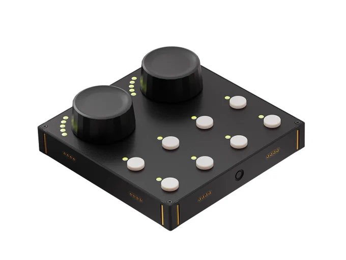 TEK2 controller from an angle, showing large endless encoders ringed with LED indicators, 8 button triggers, and pins on the side for connecting other modules.