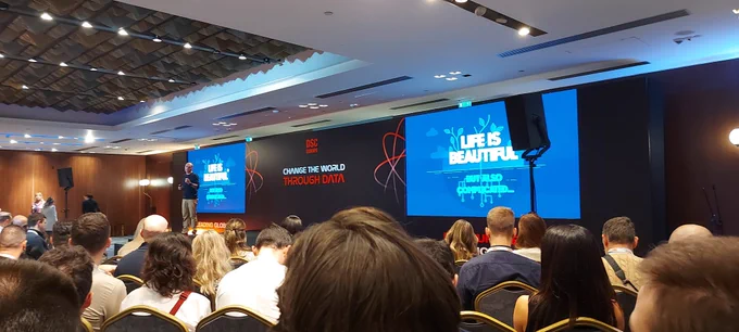 Research scientist Marko Njegomir at the Datascience conference in Belgrade listening to Dragan Tomić talk about AI. He brought Microsoft and Databricks to Serbia.