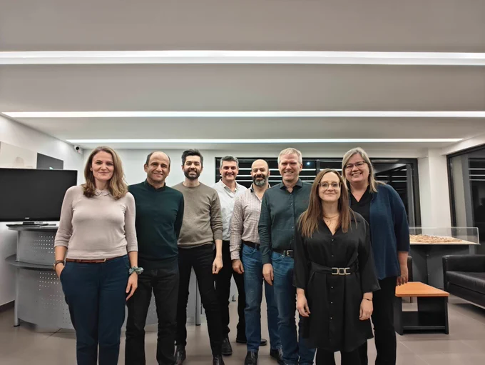 All partners of the Immerse project smiling at the camera.