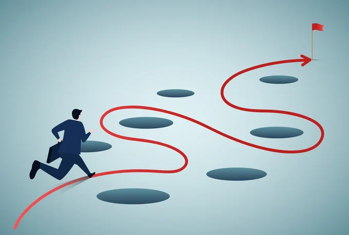 The image shows a man about to run what looks like an obstacle course around several holes toward the end point that has a red flag.