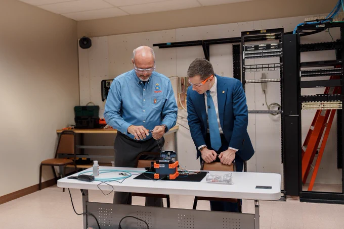 Secretary Pete and an instructor at an IBEW Training Facility. 
