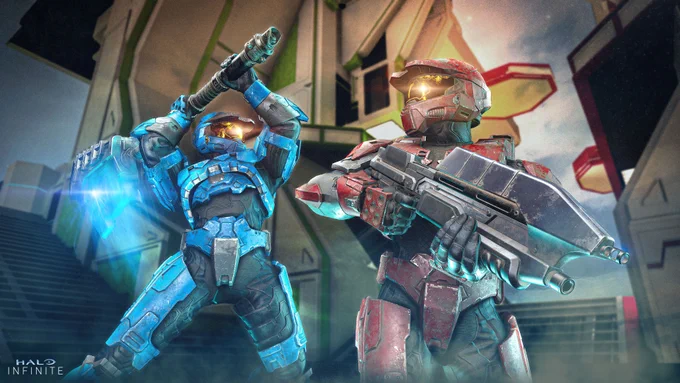 Image of a blue Spartan about to throw down with the Gravity Hammer against a red Spartan wielding an M A 40 Assault Rifle