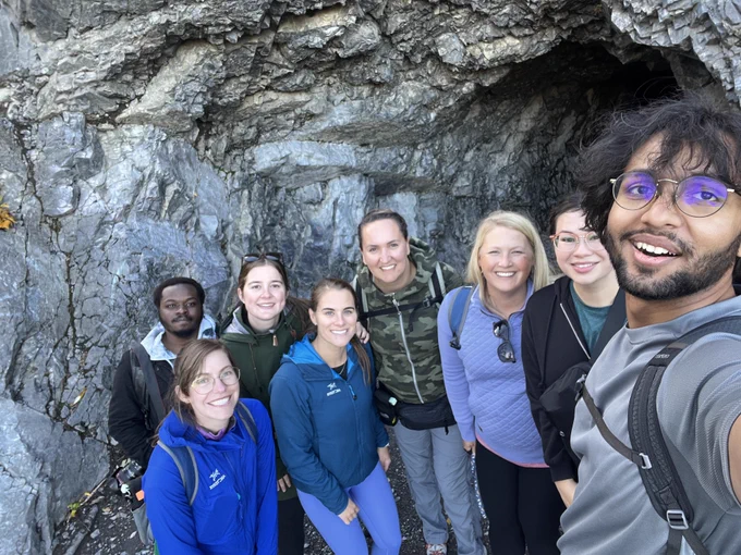 The ENHANCE Lab Team Together at Heart Creek Bunker. Everyone in the lab poses in front of the bunker at Heart Creek.