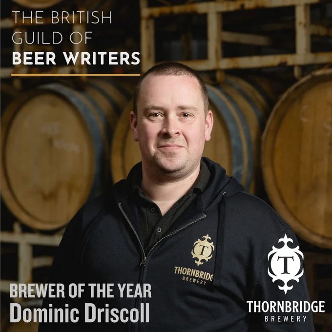 A picture of Dominic with text saying 'Brewer of the year, Dominic Driscoll'.