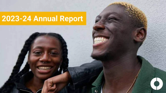 Image shows a head and shoulders photo of two people smiling and laughing, one resting an arm on the other's shoulder. Words read, '2023-24 Annual Report' and there is a small logo for OnePlusOne in the bottom right-hand corner.