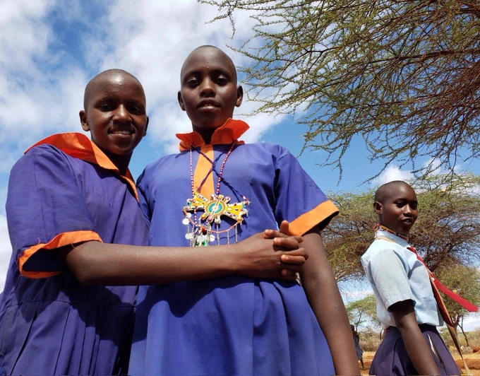 Girls attending a school lesson in Kenya