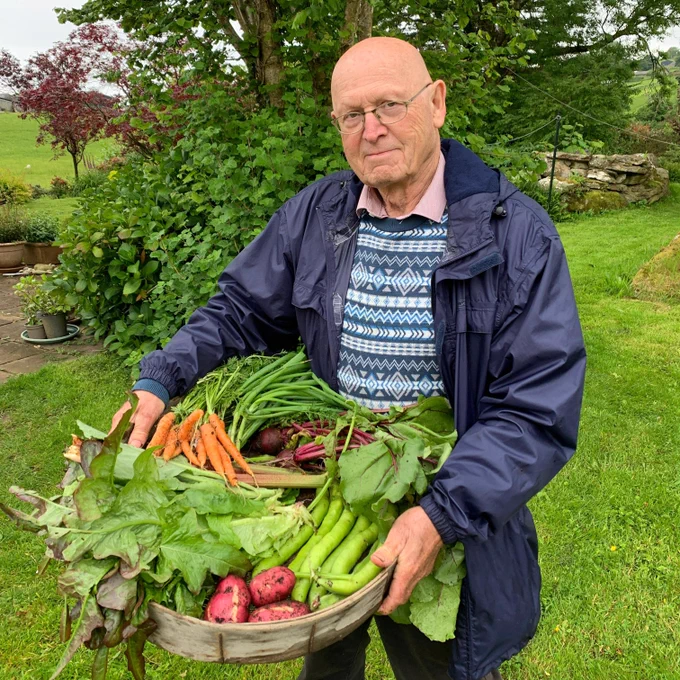 Jack First with an array of veg harvested in early June