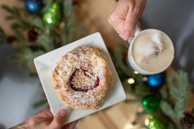 Image of Danish and tea latte.