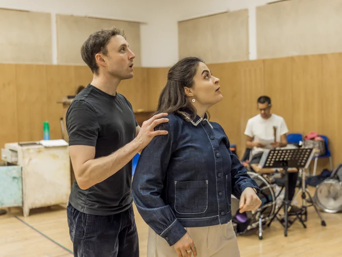Ned Costello is Hansel and Yasemin Ozdemir is Gretel in Hansel and Gretel (2024/5). 

Two actors wearing street clothes rehearse for a performance in a rehearsal studio. 