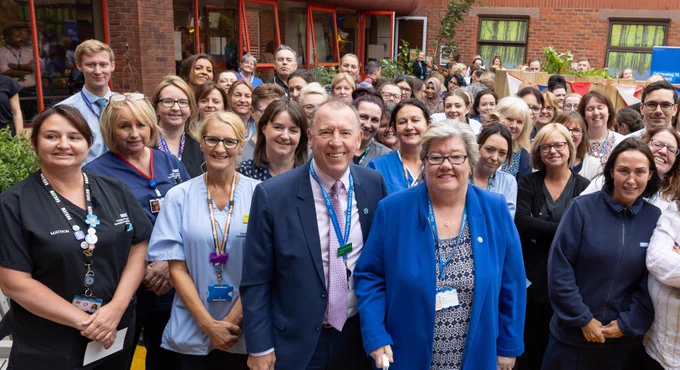 Ann Marr OBE pictured with Trust staff at Southport Hospital