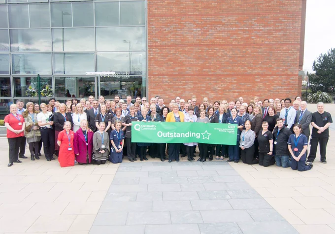 CQC rating of Outstanding, staff celebrate at Whiston Hospital.