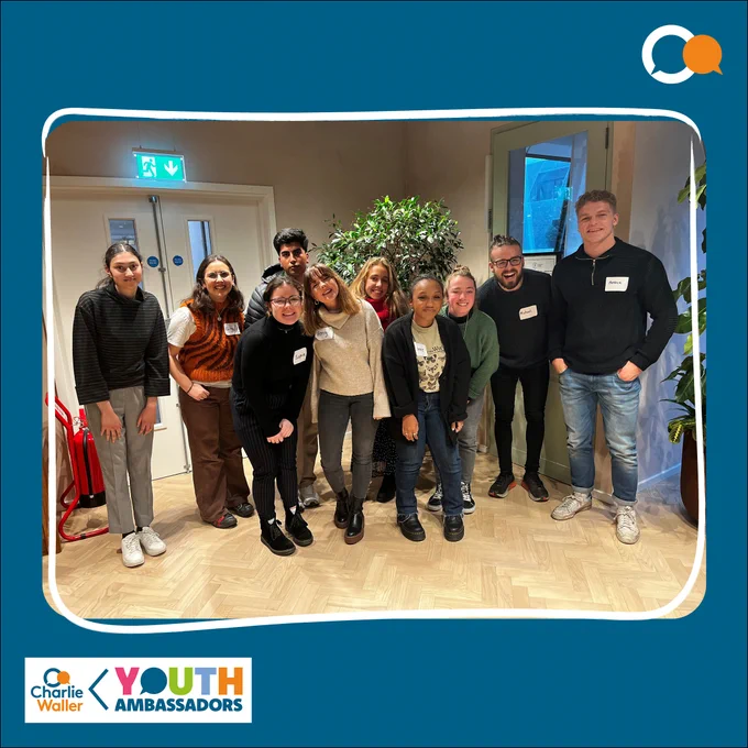 Group of ten Charlie Waller Youth Ambassadors posing together indoors, smiling for a photo.